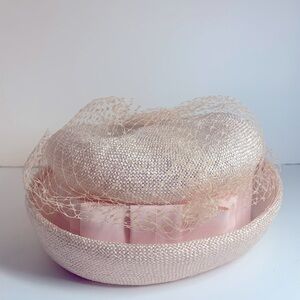 Vintage 1960’s Pillbox pink hat with pink bands and veil.